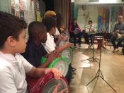 Moffet Students playing the doumbek with Percussion Director Hafez