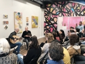 A captivated audience listens Hafez and Issam's improvisations