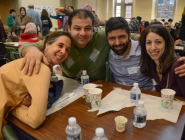 All smiles from our volunteers and refugee family member