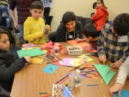 Art table with kids creating their own pieces