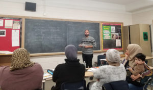 Fouad leads English class for Arab parents